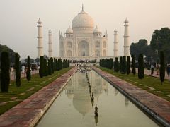 
Agra Taj Mahal Reflected In Pool From Entrance Darwaza Great Gate At Sunrise
